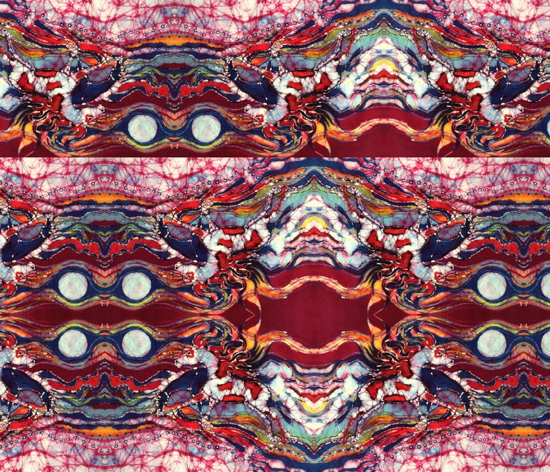 May include: Abstract batik pattern in shades of red, blue, yellow, and white. The pattern is symmetrical and features a series of curved lines and circles.