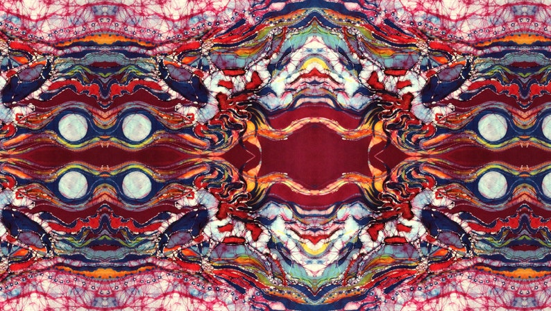 May include: Abstract batik fabric with a symmetrical design featuring swirling patterns in shades of red, blue, yellow, and white.