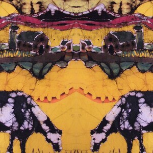 May include: Abstract batik art print with a symmetrical design. The artwork features a yellow background with black and white cows grazing on grass. Above, there's a landscape with houses, trees, and a red river.