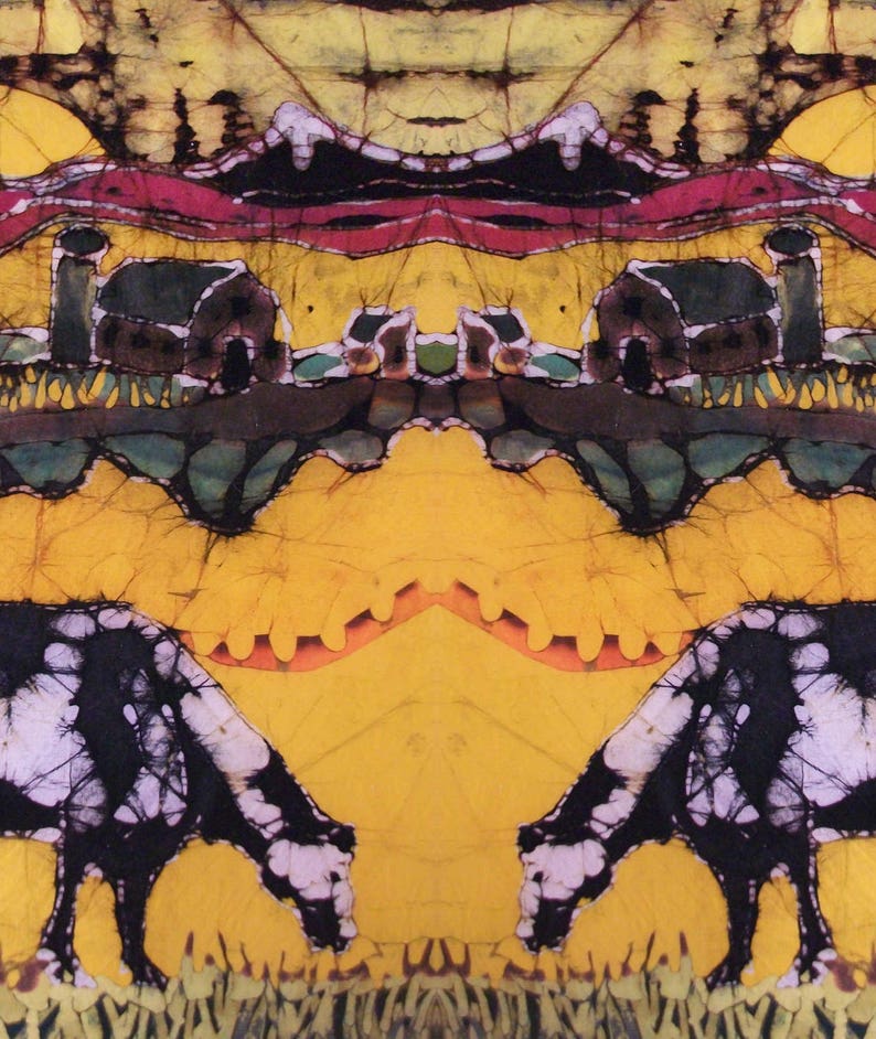 May include: Abstract batik art print with a symmetrical design. The artwork features a yellow background with black and white cows grazing on grass. Above, there's a landscape with houses, trees, and a red river.