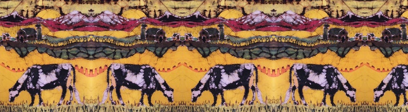 May include: A vibrant batik textile with a repeating pattern of cows grazing in a field. The design features a yellow background, green and brown hills, and a red and purple sky. The cows are black and white.