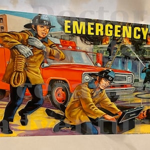 May include: Vintage illustration of a fire scene with the word "EMERGENCY!" in yellow. Two firefighters in tan coats and black helmets are depicted, one carrying a rope, the other attending to a case. A red fire truck is in the background.