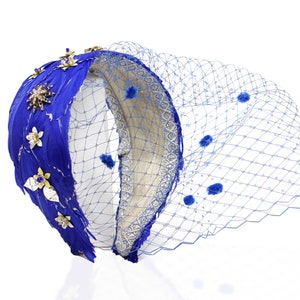 Elegant Feathered Headband with Jewel Embellishment for Weddings, Proms, and Special Occasions