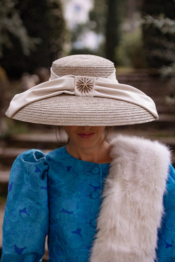 Elegant Natural Straw Saucer Hat With Jewel Embellishment  display picture 1