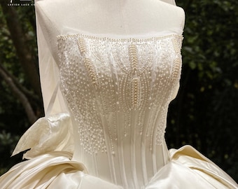 Luxury Beaded Satin Wedding Gown – Regal Strapless Corset Ball Gown with Pearls and Long Train – Custom Couture Bridal Dress