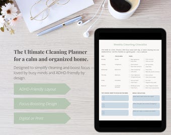 May include: A digital tablet displaying a weekly cleaning checklist. The tablet is on a light wood surface, with text that reads "The Ultimate Cleaning Planner for a calm and organized home." Other items include a pen, glasses, and a cup of coffee.