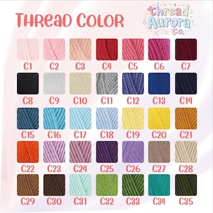 May include: A color chart displaying 35 thread colors, labeled C1 through C35. The colors range from light pink to dark green, with a variety of shades including blues, yellows, and browns. The text "THREAD COLOR" is at the top, with the brand name "thread Aurora Co." in the upper right corner.