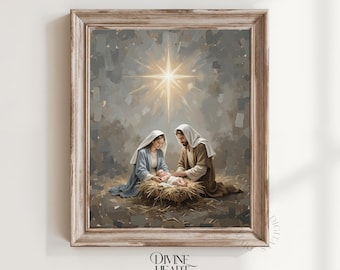 May include: A framed artwork depicting the Nativity scene. Mary and Joseph are kneeling, gazing at the baby Jesus in a manger. A bright star shines above them. The artwork is in muted tones of gray, brown, and blue.