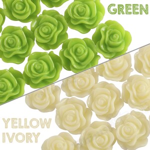 May include: Assortment of green and ivory rose-shaped embellishments.  The green roses are arranged on the left side of the image and the ivory roses are on the right side.  The word "GREEN" is printed in black letters on a white background above the green roses.  The words "YELLOW IVORY" are printed in black letters on a white background below the ivory roses.