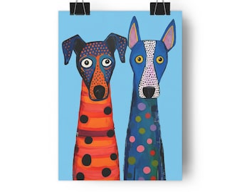 May include: A whimsical art print featuring two stylized dogs against a light blue background. One dog is orange with black polka dots and stripes, the other is blue with pink and yellow polka dots. The dogs have large, expressive eyes.