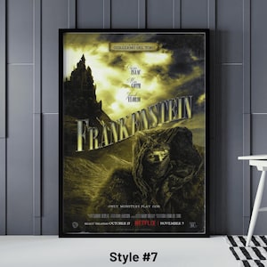 May include: A framed movie poster for "Frankenstein" in a dark, gothic style. The poster features the film's title in a stylized font, a hooded figure, and a castle silhouette. The poster includes the text "Guillermo del Toro" and the names of the actors.