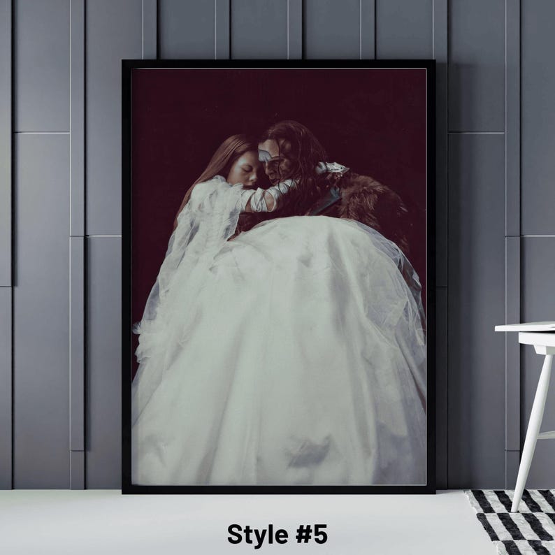 May include: A framed print featuring a romantic scene of two people embracing. The image has a dark background and the subjects are wearing white and light-colored clothing. The print is labeled "Style #5".