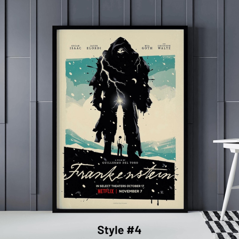 May include: Framed movie poster for "Frankenstein" with a black and white illustration of a cloaked figure and a smaller figure. The poster features the names of the actors and the release date.