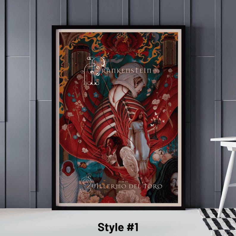 May include: Framed art print featuring a stylized illustration of Frankenstein. The artwork has a dark color palette with red, white, and blue accents. The print includes the title "Frankenstein" and the name "Guillermo del Toro" in white text. Style #1 is printed at the bottom.