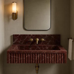 Elegant red marble wall-mounted basin featuring Rosso Levanto stone with fine white veins and artisan craftsmanship.