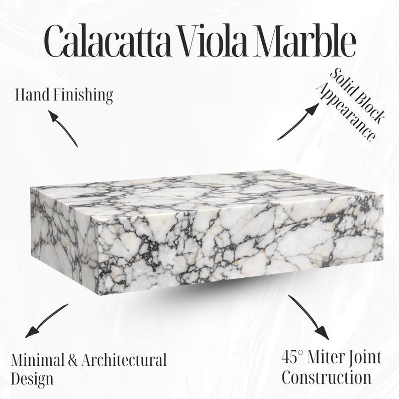 May include: A rectangular block of Calacatta Viola marble with a white base and dark gray veining. The image highlights the hand finishing, solid block appearance, minimal design, and 45&deg; miter joint construction. The text "Calacatta Viola Marble" is at the top.