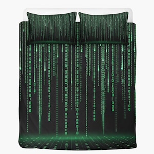 May include: Black duvet cover and pillowcase set featuring a green digital rain pattern. The design includes vertical lines of green characters, creating a futuristic, tech-inspired aesthetic. The set includes a duvet cover and two pillowcases.