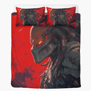 May include: Bedding set with a Predator character illustration. The duvet cover and two pillowcases feature a detailed image of the Predator, with glowing eyes and dark armour, set against a vibrant red backdrop.