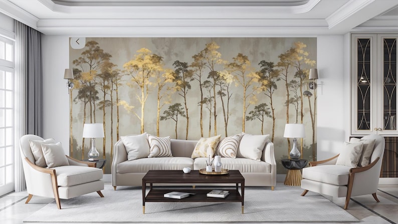 May include: A living room with a neutral color palette, featuring a large mural of stylized trees in gold and brown tones. The room includes a sofa, two armchairs, a coffee table, and lamps, creating a sophisticated and inviting atmosphere.