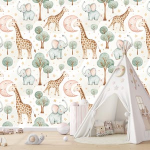 May include: A whimsical nursery scene featuring a white teepee tent, a patterned wallpaper with giraffes, elephants, moons, and trees. Decorative pillows and toys are scattered around the tent, creating a playful and inviting atmosphere.