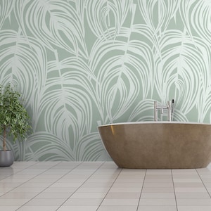 May include: A modern bathroom scene featuring a freestanding oval bathtub with a brown exterior. The backdrop is a light green wall with a white leaf pattern. A potted plant sits to the left, and the floor is tiled.
