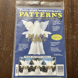 May include: A blue plastic package containing full size woodcraft patterns for three 47-inch tall angels. The front features the text PEACE ON EARTH ANGELS and instructions for assembly. The package includes illustrations of the finished angel figures.