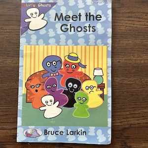 May include: A children's book cover titled "Meet the Ghosts" featuring cartoon ghosts in various colours. The cover includes the author's name, "Bruce Larkin," and the words "Colorful Ghosts."