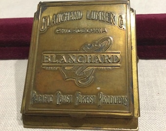 Clip publicitario antiguo de latón de principios del siglo XX ~ Blanchard Lumber Co. ~ Filadelfia, PA