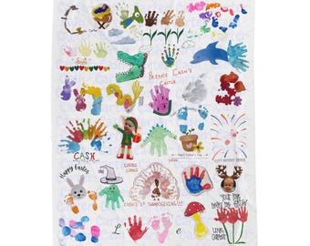 May include: A white sheet featuring various colourful handprints, footprints, and drawings. Text includes "CASH", "Happy Easter", "PRINCE CASH'S CASTLE", "CASH'S 1st THANKSGIVING!!!", and "your love helps me GROW".
