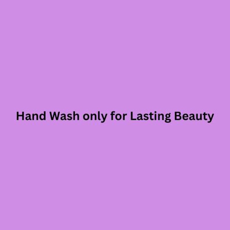 May include: Hand Wash only for Lasting Beauty text on a light purple background.