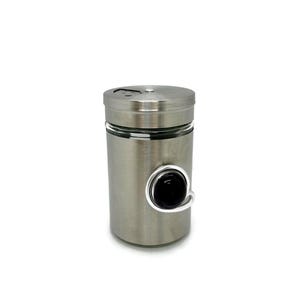 May include: A silver metal spice jar with a black glass bead on a wire loop.