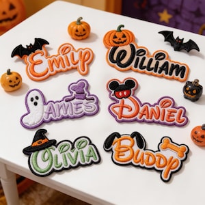 May include: Six embroidered name patches featuring Halloween themes. The patches display the names Emily, William, James, Daniel, Olivia, and Buddy, decorated with icons including a bat, pumpkin, ghost, witch hat, and dog ears with a bone.