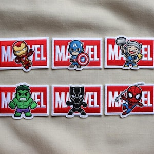 May include: A set of three ceramic mugs with a speckled, matte finish. The mugs are in shades of cream, light gray, and dark gray. Each mug has a simple, minimalist design and a rounded handle.