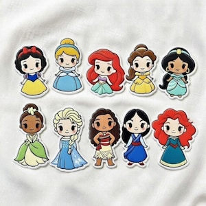 May include: A collection of ten cartoon princess stickers. Each sticker features a different princess with unique hairstyles and colorful dresses. The princesses include Snow White, Cinderella, Ariel, Belle, Jasmine, Tiana, Elsa, Moana, Mulan, and Merida.