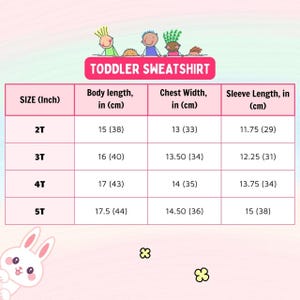Puede incluir: Una tabla rosa con medidas para una sudadera de ni&ntilde;o peque&ntilde;o. La tabla incluye tallas 2T, 3T, 4T y 5T, con medidas de largo de cuerpo, ancho de pecho y largo de manga en pulgadas y cent&iacute;metros. El texto "TODDLER SWEATSHIRT" est&aacute; en la parte superior.