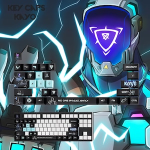 Könnte beinhalten: Eine mechanische Tastatur mit individuellen Tastenkappen im futuristischen Design. Die Tastenkappen haben ein Schwarz-Weiß-Farbschema mit blauen Akzenten. Das Bild enthält den Text "KEY CAPS KAYO" und "NO ONE WALKS AWAY".