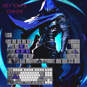 May include: A computer keyboard with custom keycaps featuring a blue and purple design. The keycaps have images of a character from the game Valorant. The text "KEY CAPS OMEN" is visible at the top of the image.