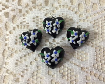 Handblown Black Puffy Glass Heart Pendant Adorned With Pretty Flowers