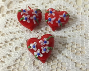 Handblown Red Puffy Glass Heart Pendant Adorned With Pretty Flowers