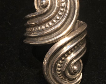 Vintage Sterling Silver Taxco Mexican Repousse Hinged Bypass Bracelet