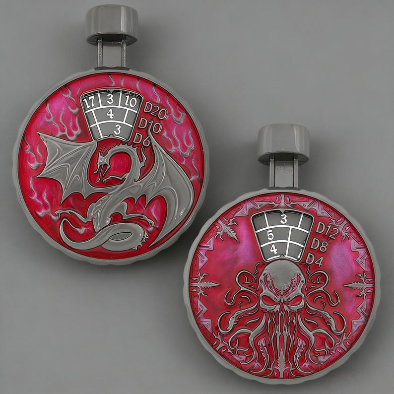 May include: Two silver and red dice rollers with a dragon and Cthulhu design. Each roller has a number display and a handle. The dragon roller shows numbers 17, 3, 10, 4, and 3. The Cthulhu roller shows numbers 3, 5, and 4.