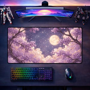 May include: A large rectangular mouse pad featuring a nighttime landscape with a full moon, flowering trees, and a starry sky. A rainbow-lit keyboard and a black mouse are below. A curved monitor and two robot figures are above.