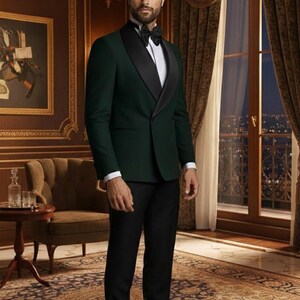 May include: A dark green tuxedo jacket with black lapels and a black bow tie. The jacket is paired with black trousers and a white dress shirt. The man is standing in a room with ornate decor, a patterned rug, and a city view through a window.