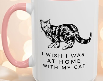 猫と一緒に家にいたい。猫好きのための心地よいマグカップ。猫の飼い主さんへのプレゼントに最適。猫をテーマにしたインテリアギフト。おもしろコーヒーマグ。