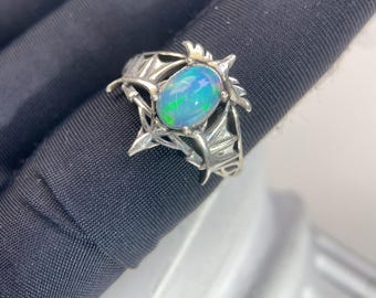Thorn crown oval opal claw