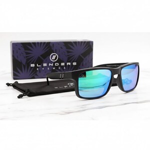 May include: Black sunglasses with blue and green reflective lenses. The sunglasses are displayed with a black carrying case and a box with the brand name "BLENDERS EYEWEAR". The box has a purple leaf pattern.