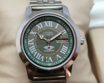 Reloj Citizen vintage automático de acero inoxidable con 21 rubíes y fecha para hombre (esfera con números romanos)