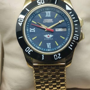 Vintage Citizen Automatic Diver Watch: Blue Textured Dial, Gold Tone Bracelet