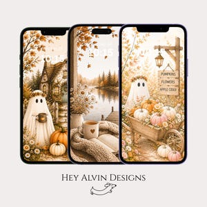 Könnte beinhalten: Drei Smartphones mit herbstlichen digitalen Hintergrundbildern, die Geister, Kürbisse, Blumen und gemütliche Szenen zeigen. Der rechte Bildschirm zeigt ein Holzschild mit dem Text PUMPKINS, FLOWERS, APPLE CIDER. Unten steht HEY ALVIN DESIGNS.