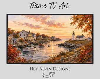 May include: A digital landscape painting for a Frame TV featuring a coastal harbor at sunset with houses, boats, and a lighthouse. The scene includes warm orange and yellow sky tones, autumn foliage, and the text Frame TV Art and Hey Alvin Designs.